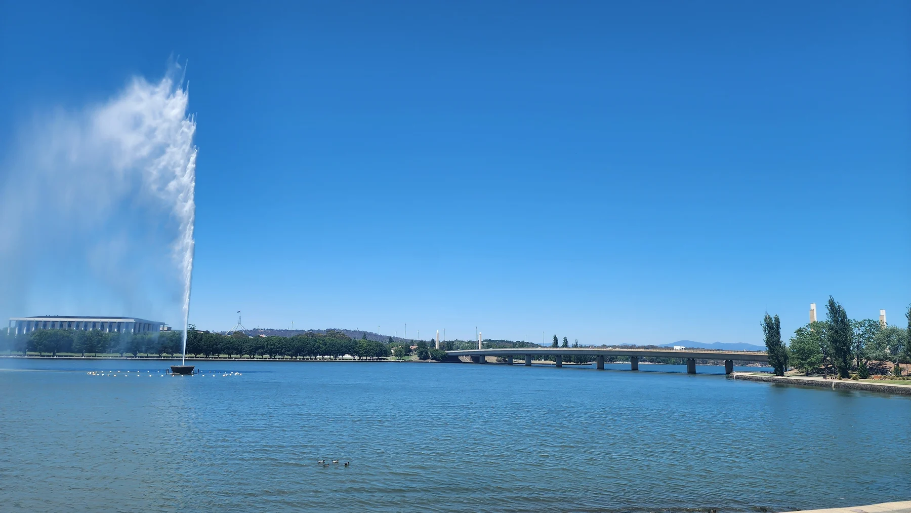 Lake Burley Griffin and Canberra landmarks photographed from the lakeside